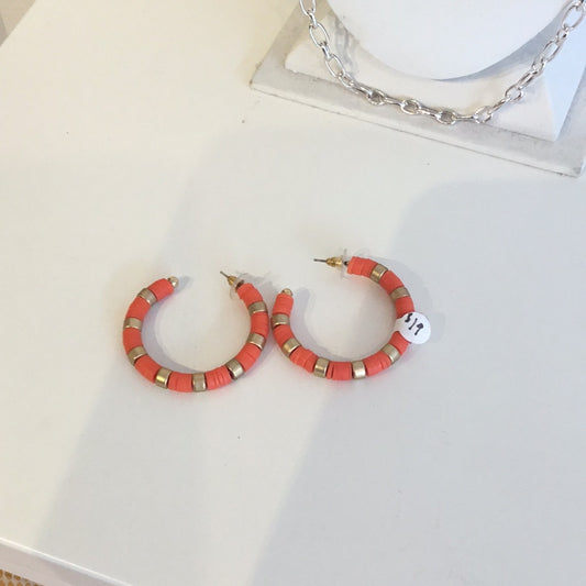 Orange hoop earrings